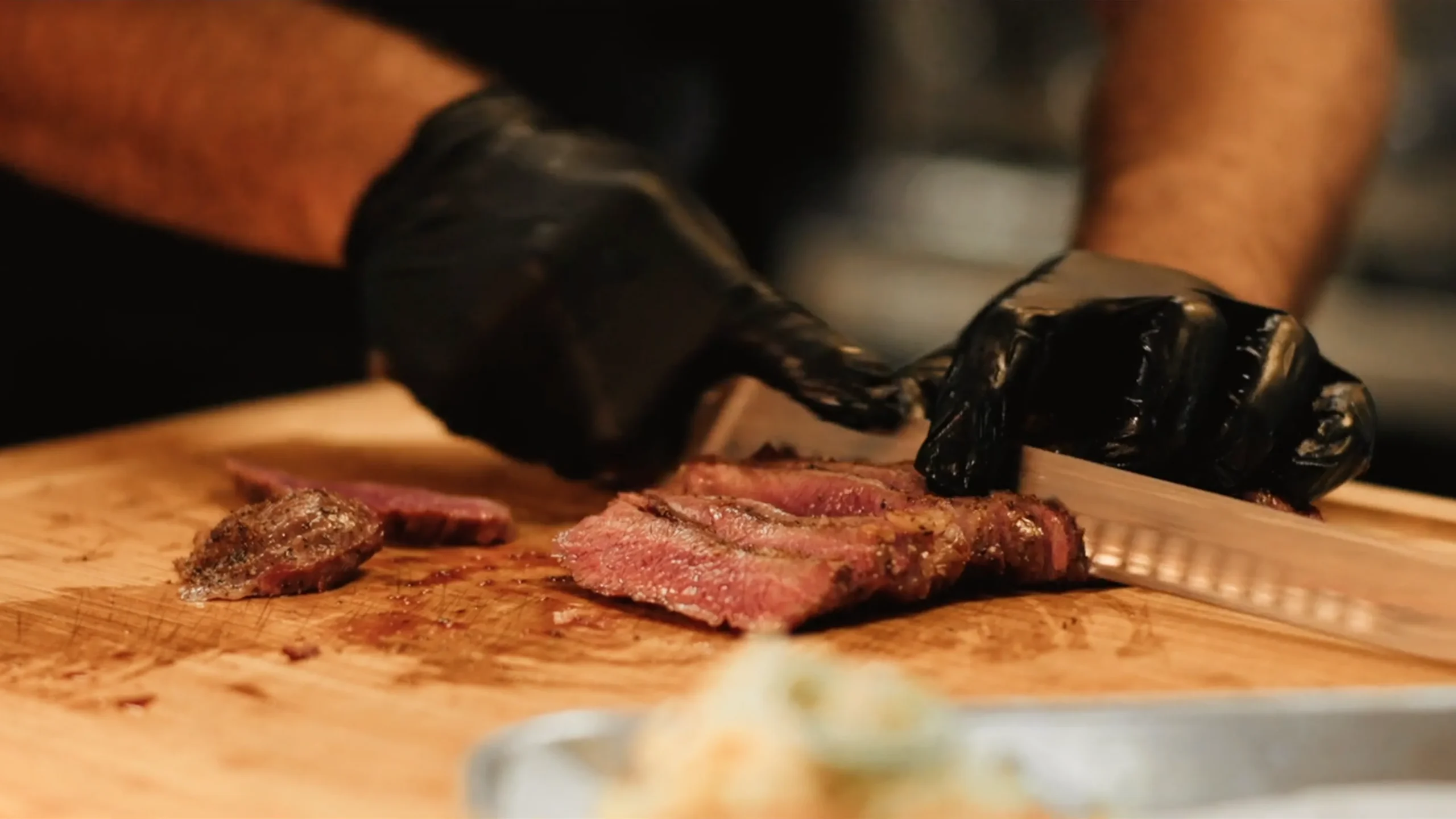 Santa Maria-style Wagyu tri-tip, served with slaw, pickled onions, and dinner rolls